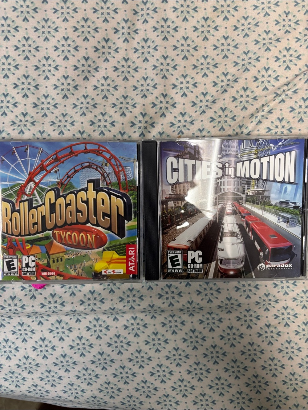 Atari RollerCoaster Tycoon & Paradox Cities in Motion PC Game Bundle - Red, Blue